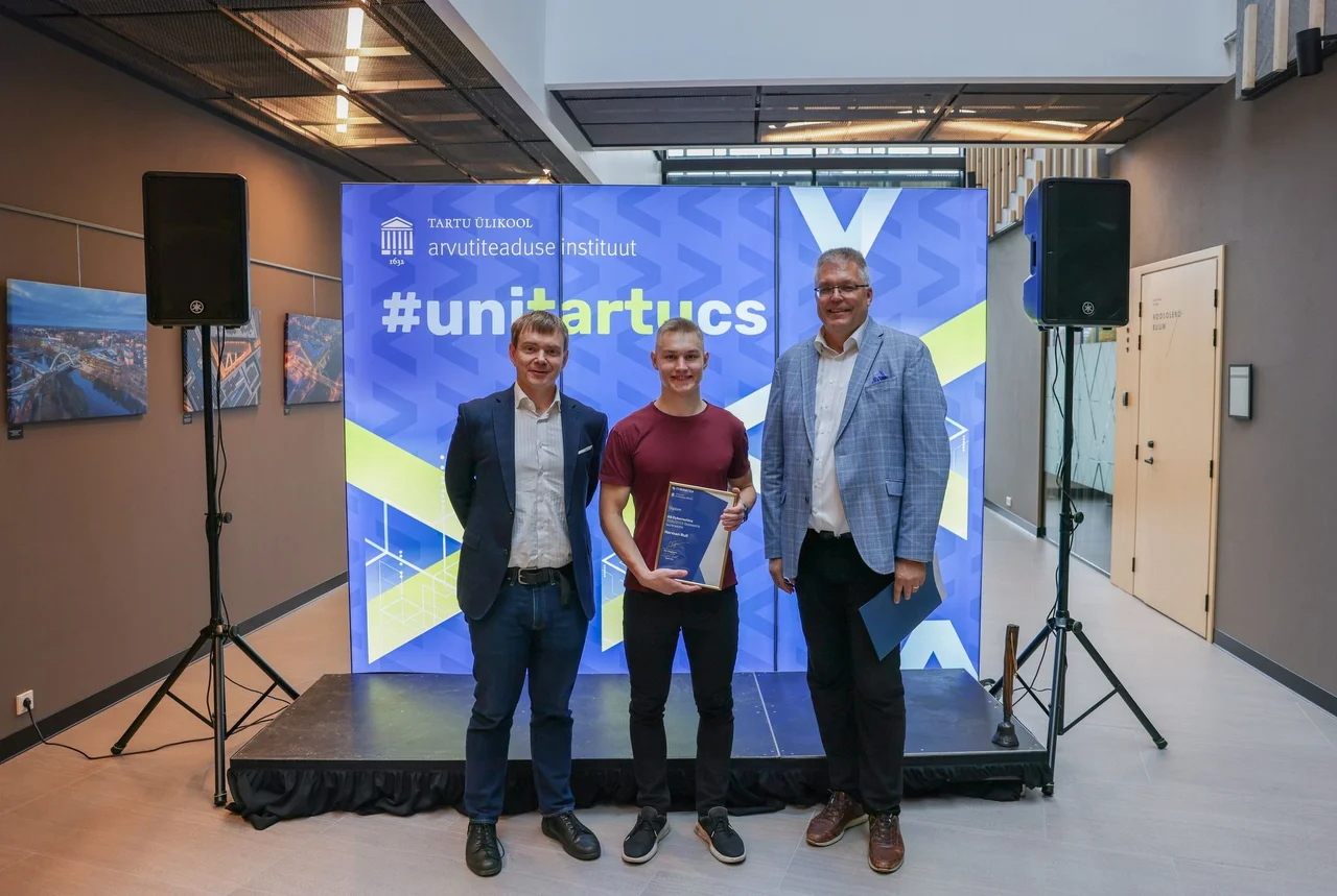 Pictured here Dan Bogdanov (left) and the recepient of Cybernetica's fellowship 2022 Herman Rull (centre)