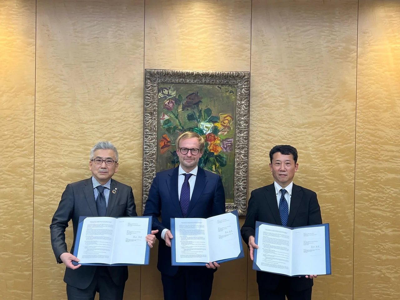 Cybernetica, SMTB and NEC representatives with the signed MoU's
