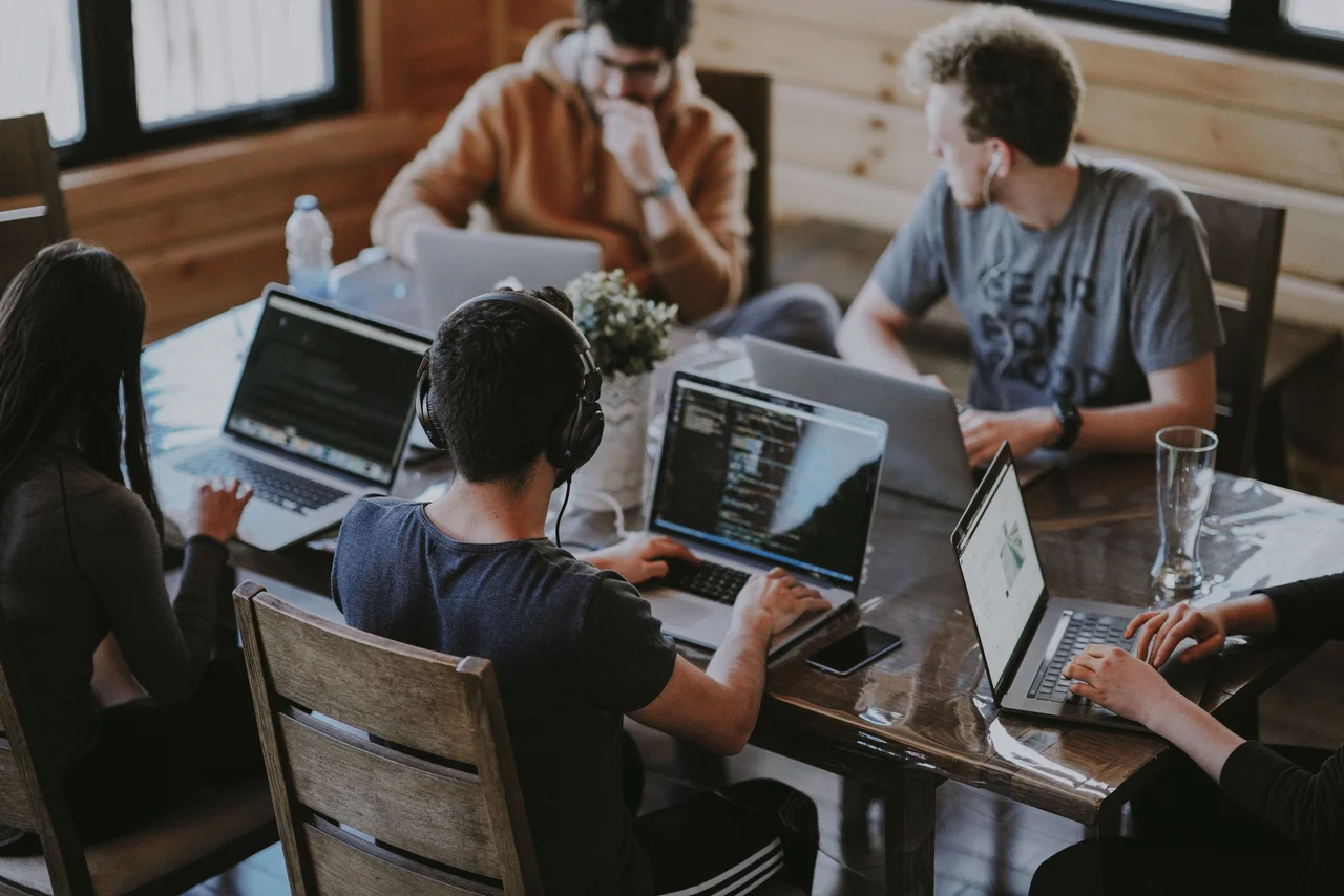 People working together on laptops