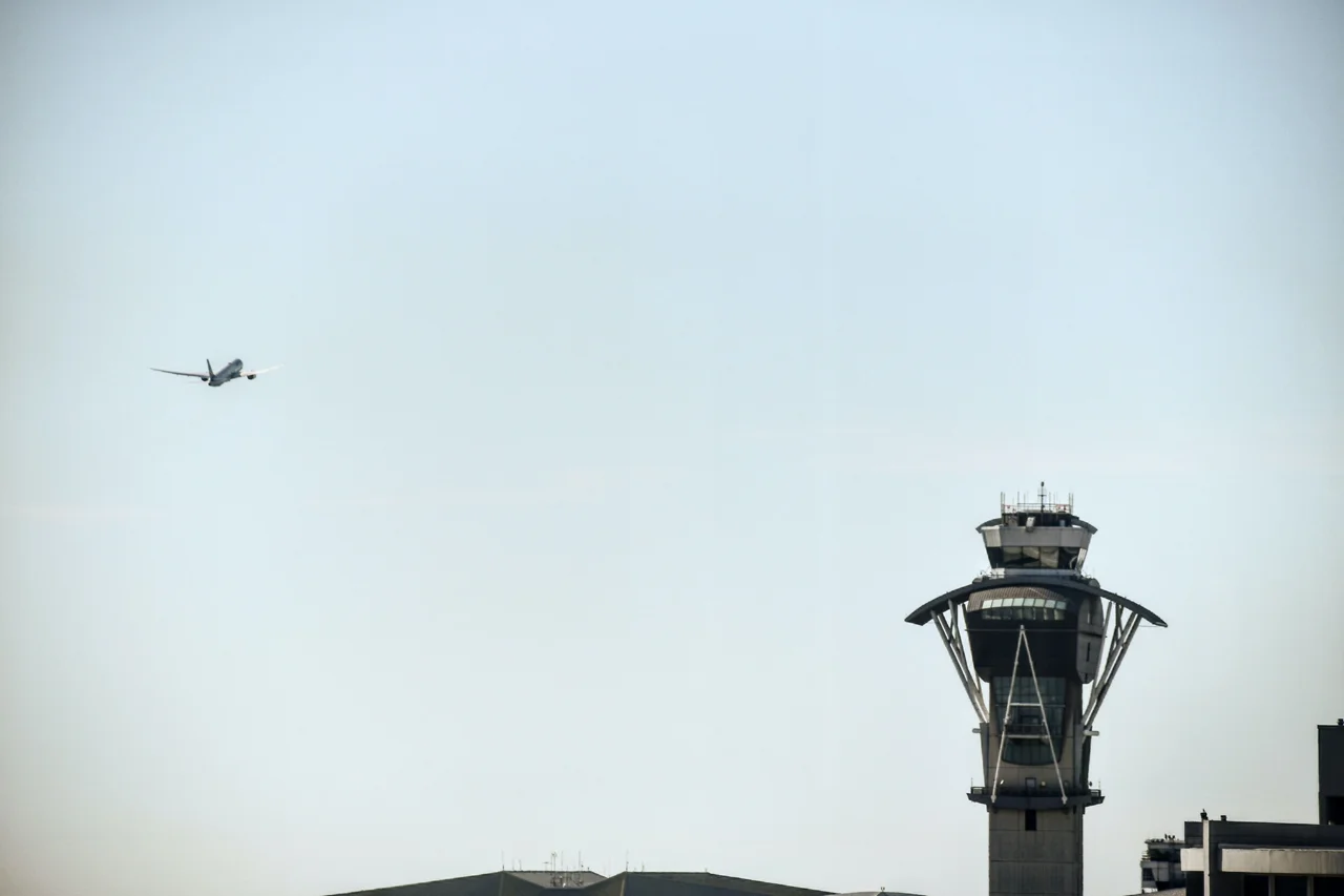 Airplane and a control tower