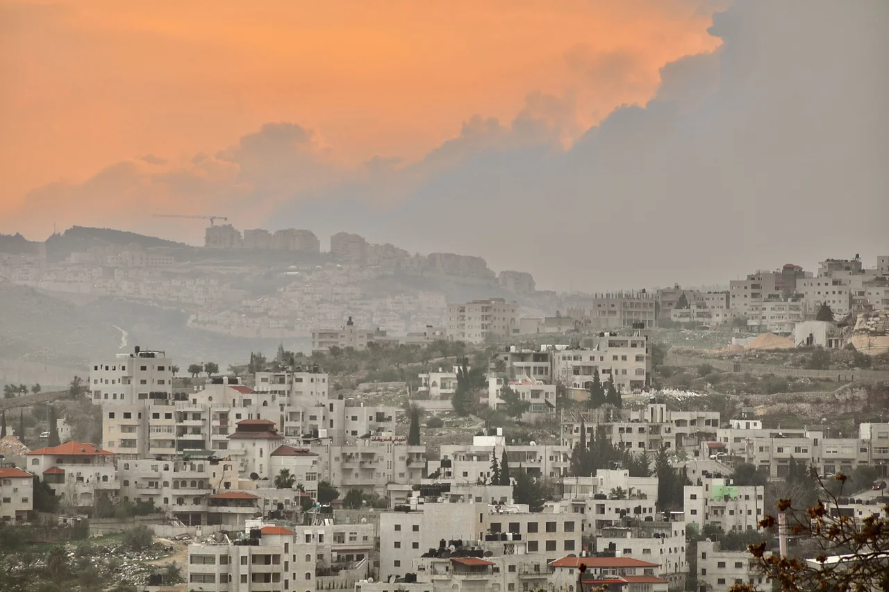 White buildings and sunset sky