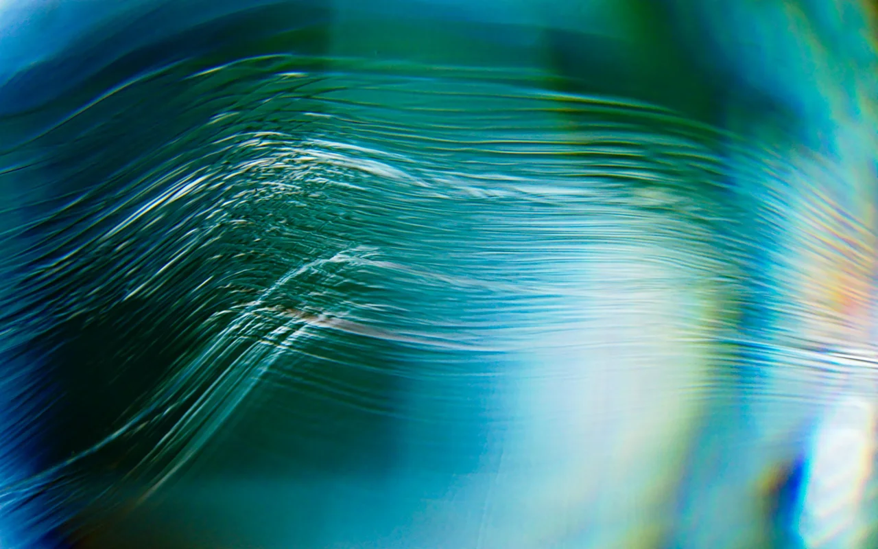 White lines on a blue and green background