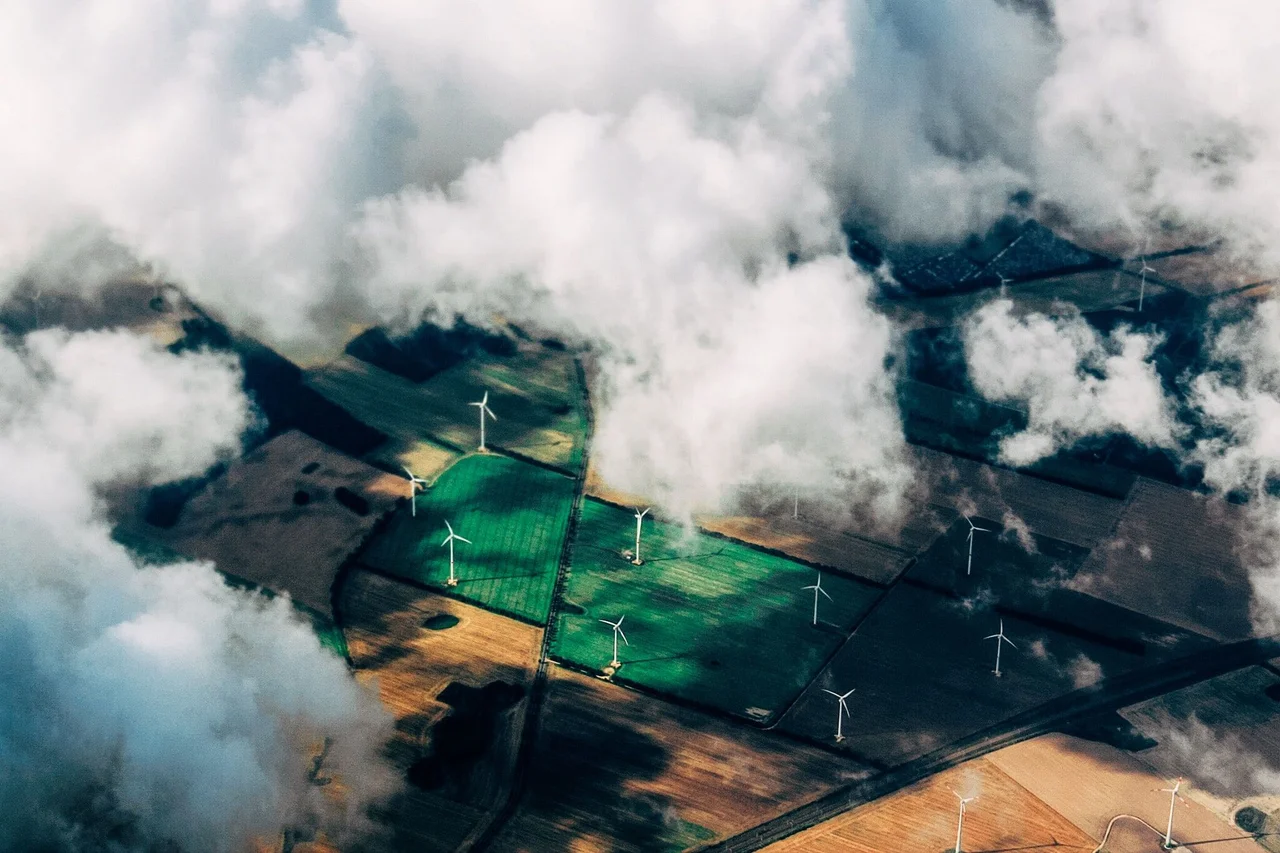 Fields through the clouds (bird eye visual)